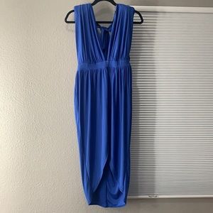 Blue plunging neck dress.
